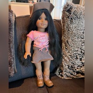 American Girl doll with outfit